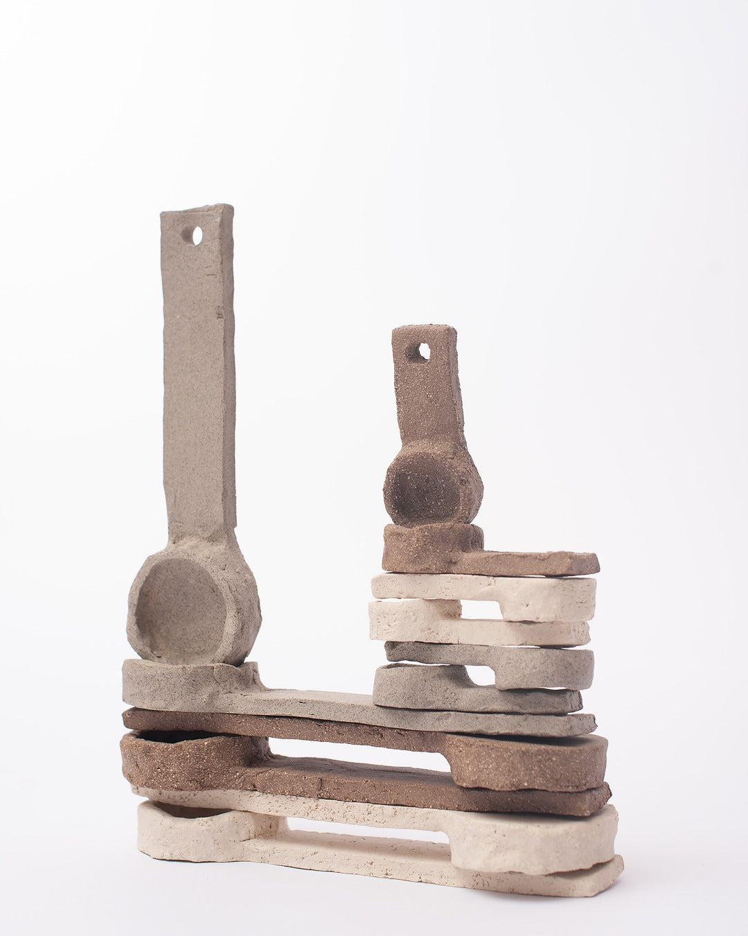 Set of ceramic spoons on a white background #5