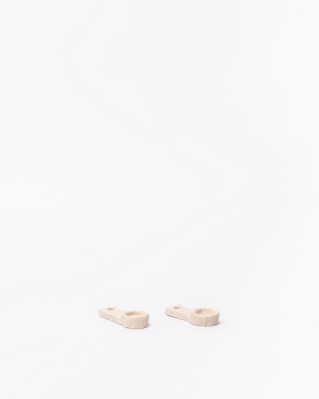 Set of ceramic spoons on a white background #6