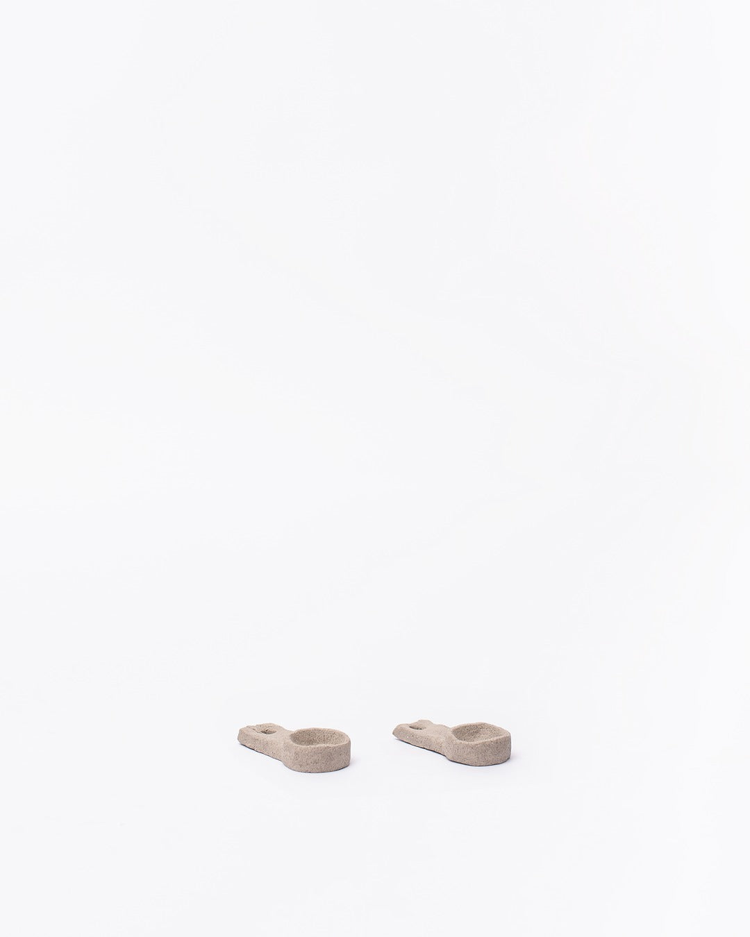 Set of ceramic spoons on a white background #7