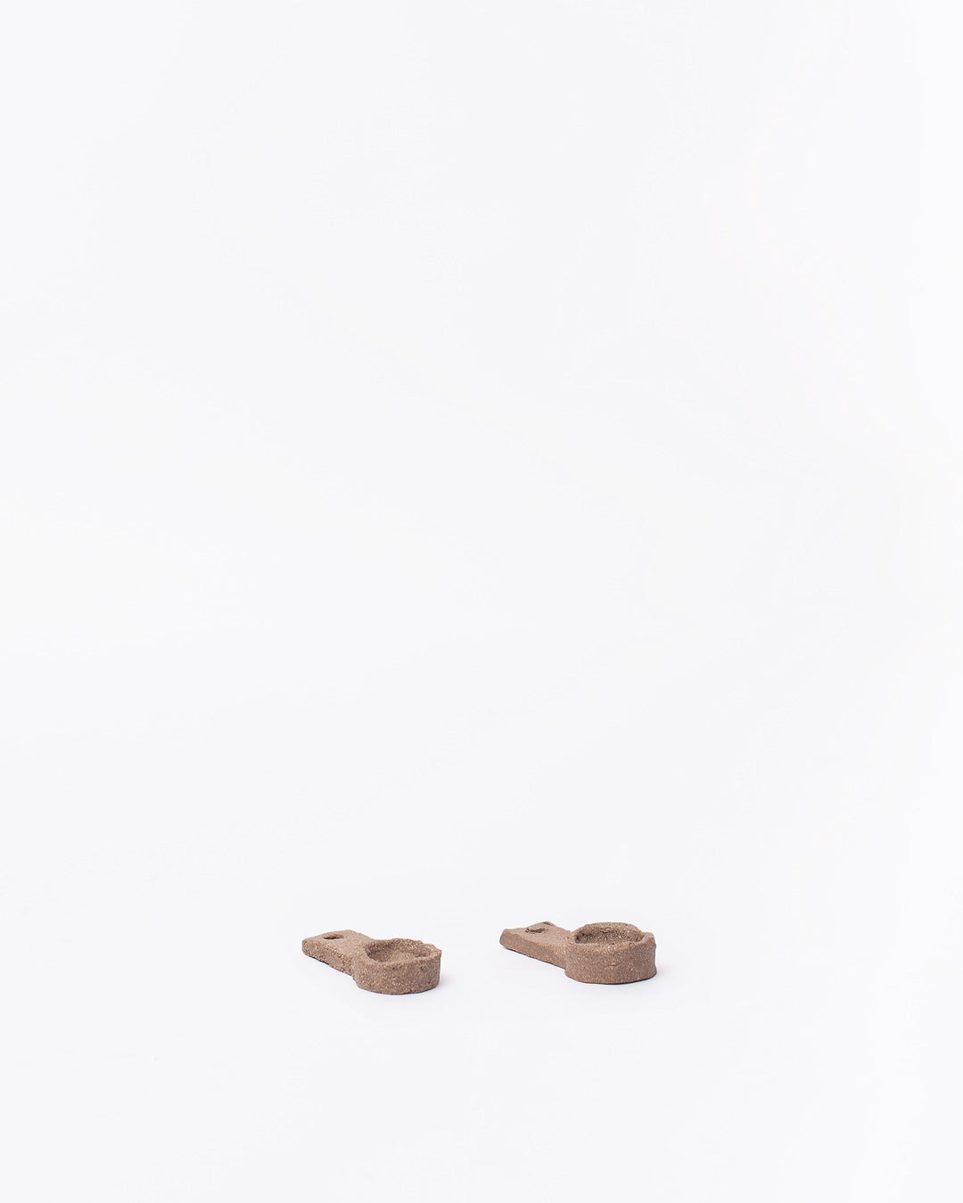 Set of ceramic spoons on a white background #8