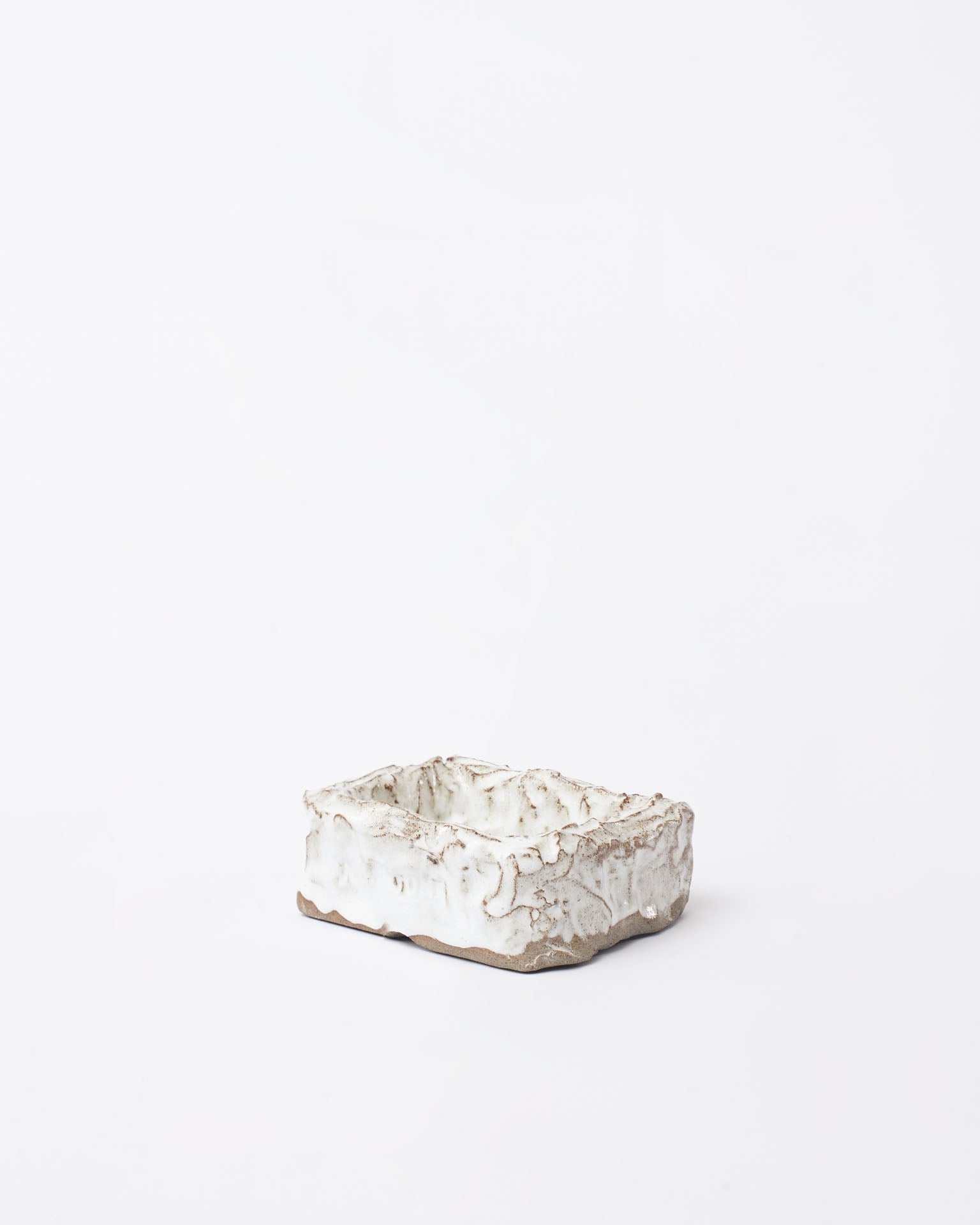 Handmade ceramic organizer object white front position in white background