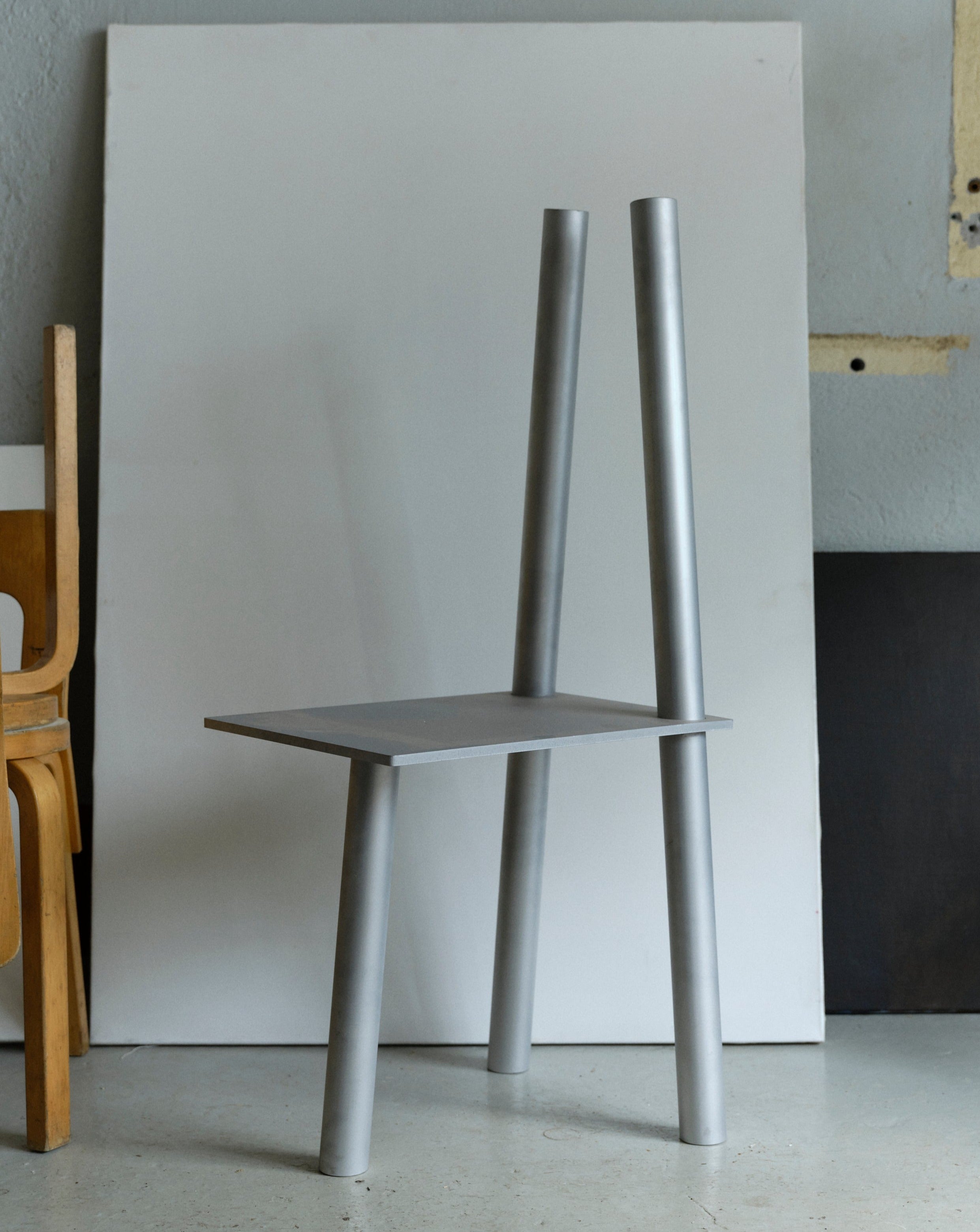 Lifestyle background, aluminum decorative chair P-L series in inclined position