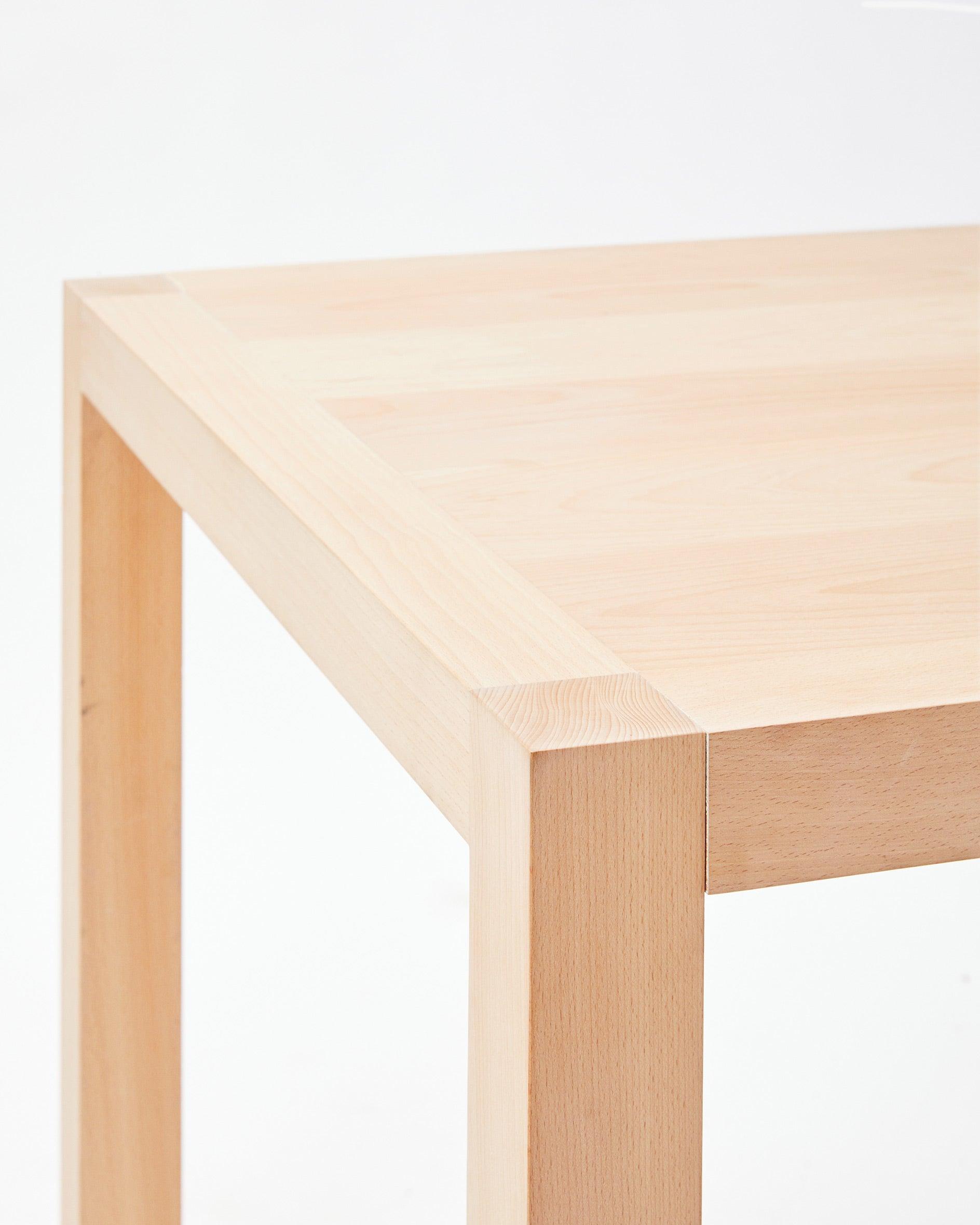 Handmade in denmark table corner on white background