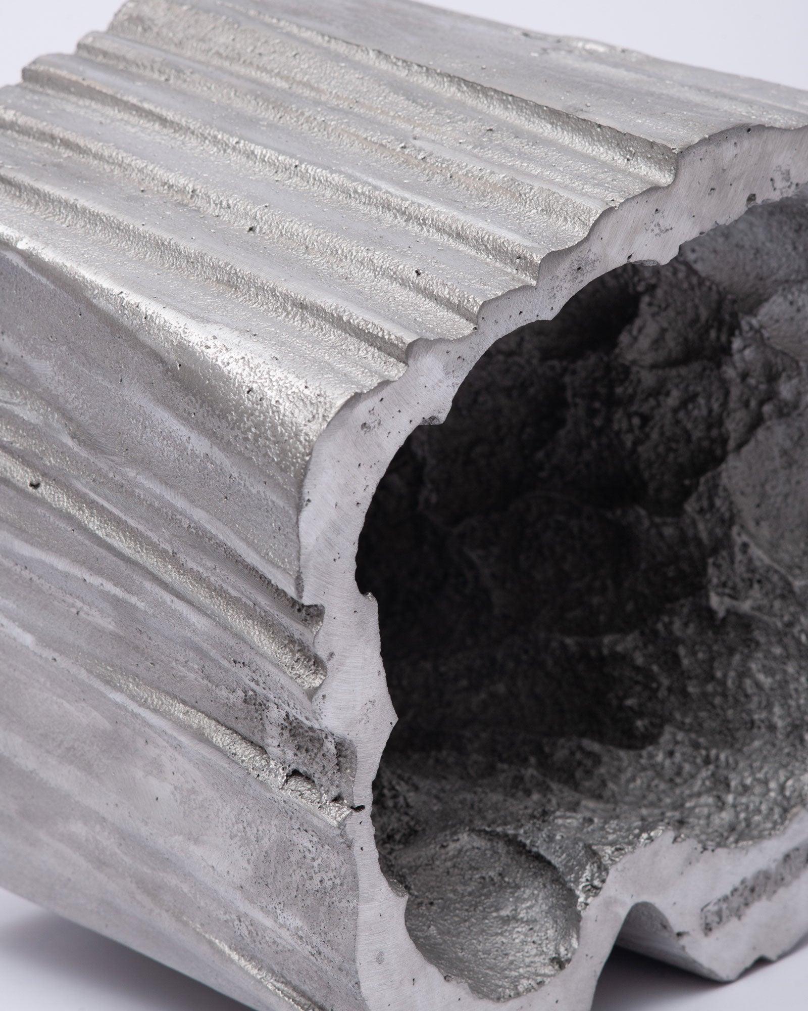 Close-up view of scooped bucket smaller